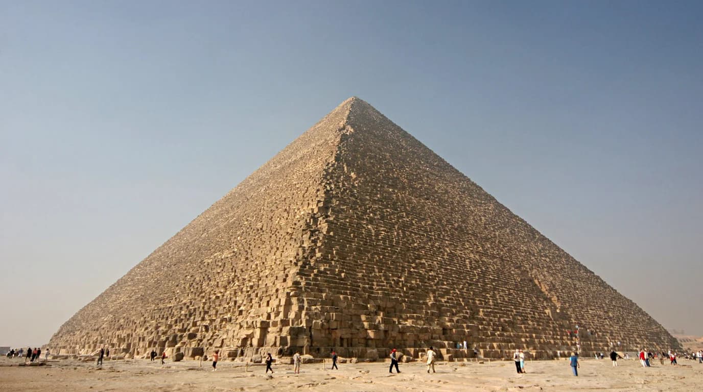 The Great Pyramid of Giza at twilight, starlight aligning with its apex.