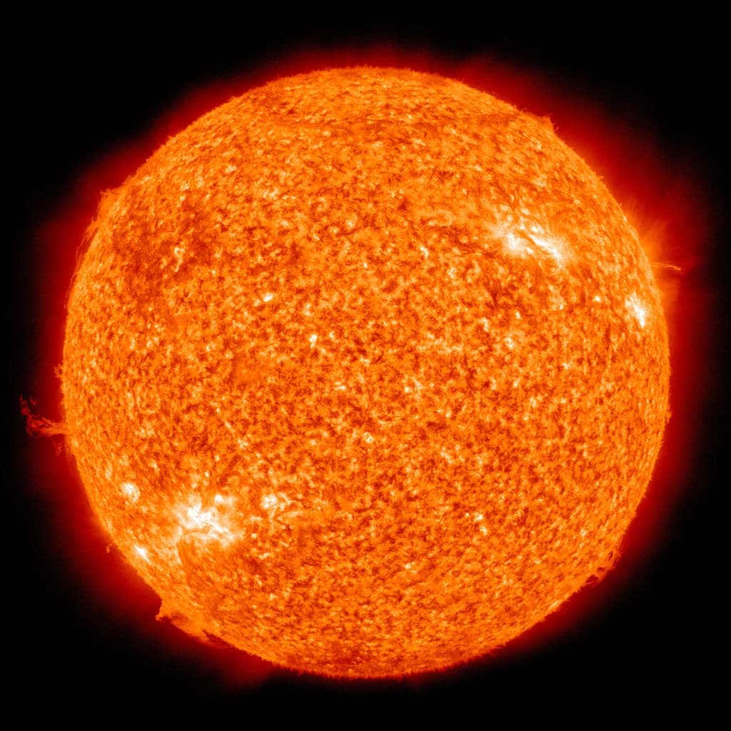 The Sun in ultraviolet — roiling plasma and arcing prominences.